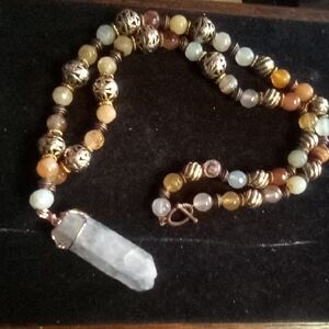Vibrant Beaded Necklace with Quartz Pendant